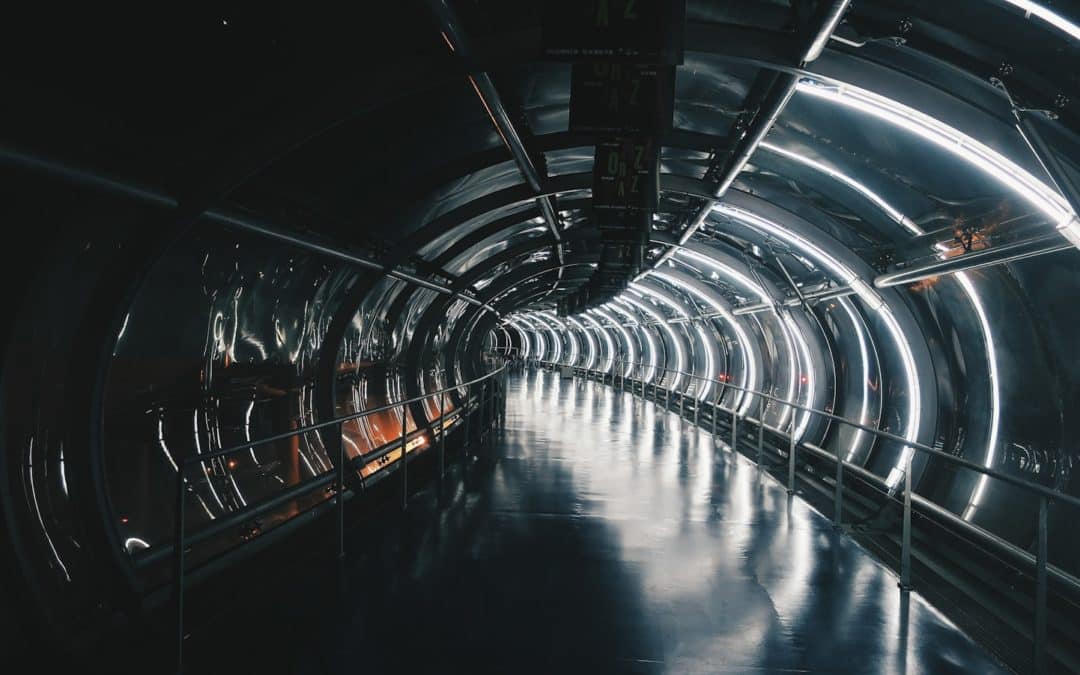 a tunnel that is very dark and empty